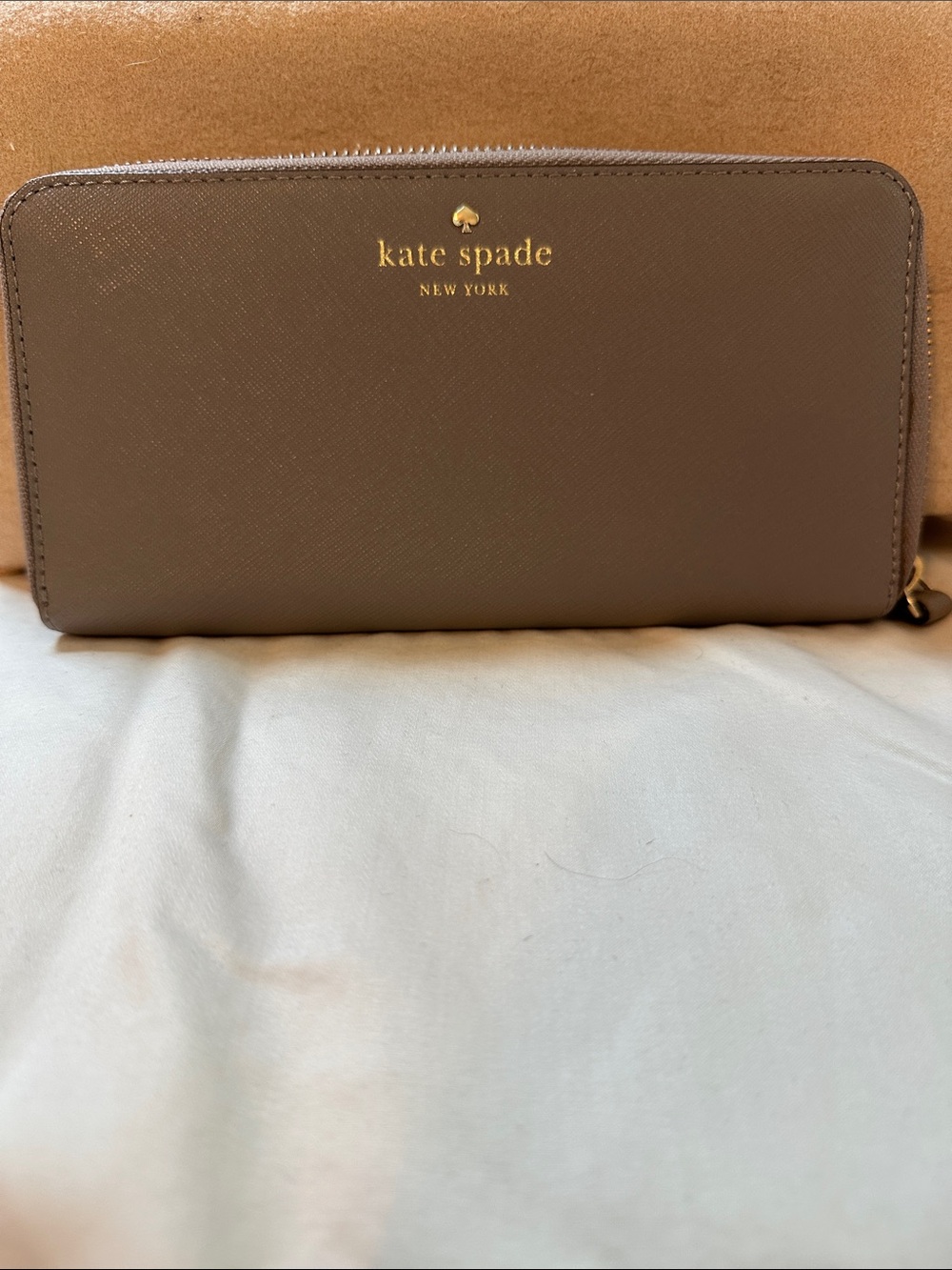 kate spade Taupe Saffiano Zip Wallet with Gold Logo
